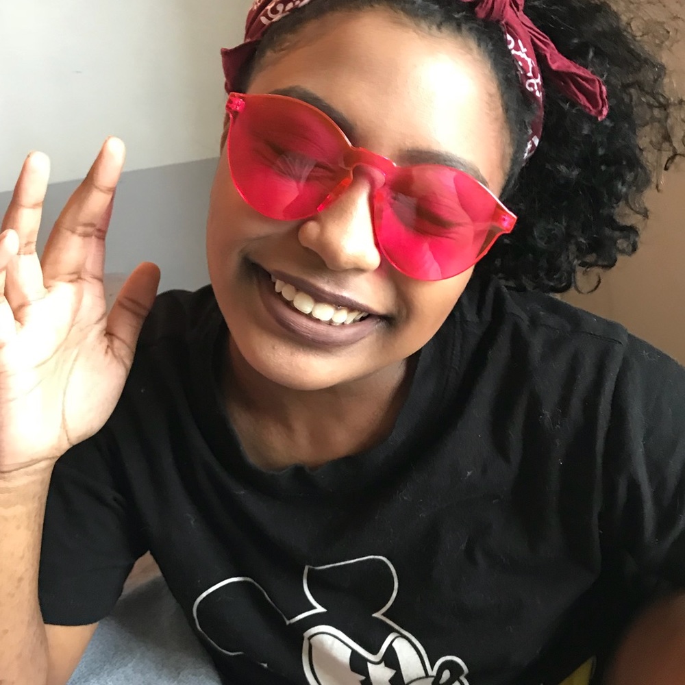 Hot pink frameless sunglasses with case
